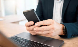 text message, phone, laptop